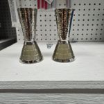 Hammered silver candle sticks with silver kotel design