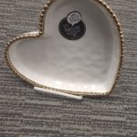 White heart shaped bowls with gold trim